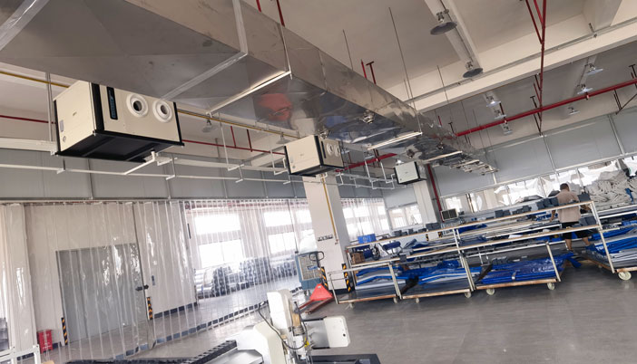 制衣廠制冷降溫，安裝星科蒸發冷省電空調-臥式射流款